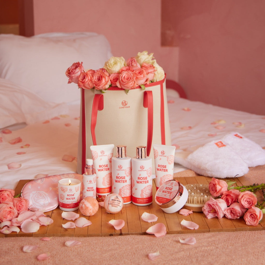 12pcs Gifts Rose Water Gift Set. Celebrate Valentine's Day in luxury with our 12-piece rose water gift set. Immerse yourself and your loved one in the delicate scent of roses. Enjoy a spa-like experience with our shower gel, body scrub, oil, eye mask, slippers, and more. Comes with an exquisite bag perfect for a day out, beach or shopping trip. Treat yourselves to a relaxing escape this Valentine's Day.
