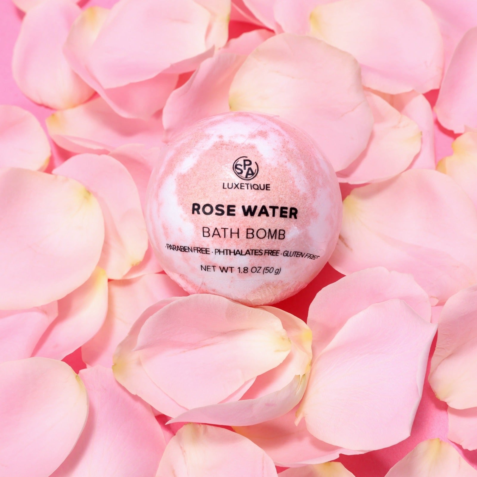 12pcs Gifts Rose Water Gift Set. Transform your bath into a luxurious spa experience with our Rose Oil Bath Bomb. Infused with moisturizing Coconut Oil, Vitamin E, and Shea Butter, this bath bomb will leave your skin hydrated, soft, and glowing. Soothing Rose Oil will provide a calming aroma and enhance your skin's natural radiance. Indulge in ultimate relaxation and rejuvenation at home with our Rose Oil Bath Bomb.